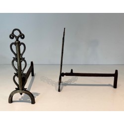 Pair of Brass and Iron Andirons with Stacked Scroll-Column Uprights on Arched Bases, in the Style of Raymond Subes