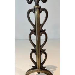 Pair of Brass and Iron Andirons with Stacked Scroll-Column Uprights on Arched Bases, in the Style of Raymond Subes