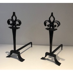 Important Pair of Wrought Iron Andirons with Heraldic Fleur-de-Lys Finials on Spreading Bases