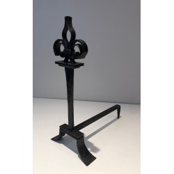 Important Pair of Wrought Iron Andirons with Heraldic Fleur-de-Lys Finials on Spreading Bases