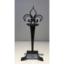 Important Pair of Wrought Iron Andirons with Heraldic Fleur-de-Lys Finials on Spreading Bases