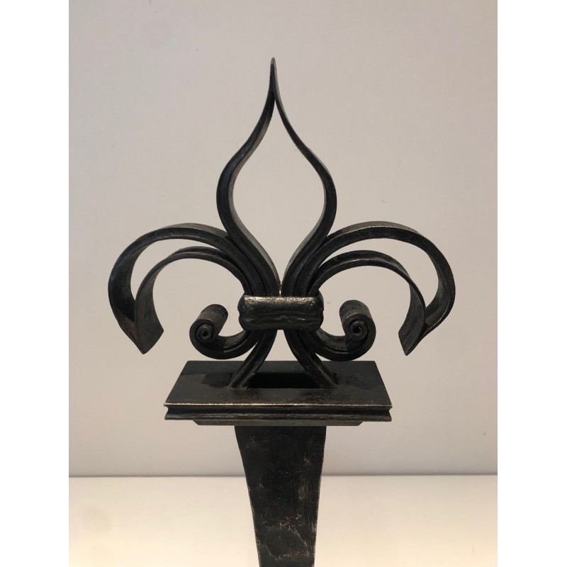 Important Pair of Wrought Iron Andirons with Heraldic Fleur-de-Lys Finials on Spreading Bases