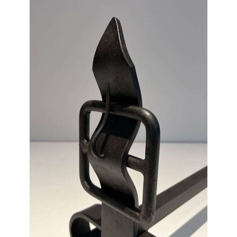 Pair of Wrought Iron Andirons with Obelisk Finials and Belt-and-Buckle Motifs on Scrolled Bases