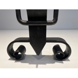 Pair of Wrought Iron Andirons with Obelisk Finials and Belt-and-Buckle Motifs on Scrolled Bases