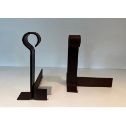 Important Pair of Modernist Wrought Iron Andirons with Circular Loop Finials and Anchor-Form Bases