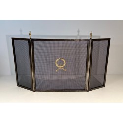 Neoclassical Style Three-Panel Steel Mesh Fireplace Screen with Brass Laurel Wreath. France. Circa 1940.