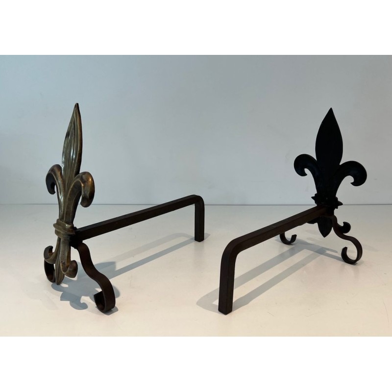 Pair of Bronze and Wrought Iron Andirons with Fleur-de-Lys Uprights. France. Circa 1940.