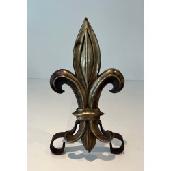 Pair of Bronze and Wrought Iron Andirons with Fleur-de-Lys Uprights. France. Circa 1940.
