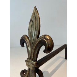 Pair of Bronze and Wrought Iron Andirons with Fleur-de-Lys Uprights. France. Circa 1940.
