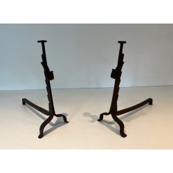 Pair of Wrought Iron Andirons with Ratchet Uprights and Tripod Bases. France. Circa 1900.