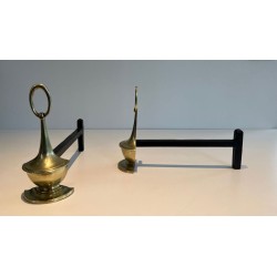 Pair of Neoclassical Bronze Andirons in the Form of Antique Oil Lamps with Oval Ring Finials. England. Circa 1960.