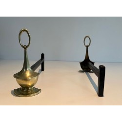 Pair of Neoclassical Bronze Andirons in the Form of Antique Oil Lamps with Oval Ring Finials. England. Circa 1960.