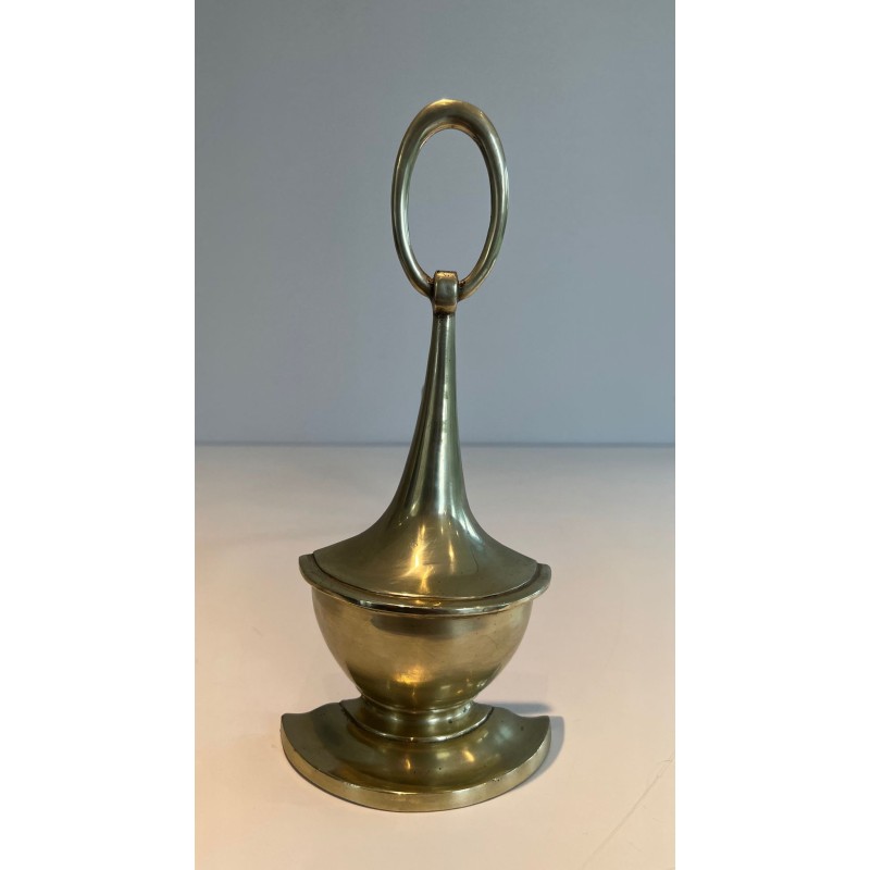 Pair of Neoclassical Bronze Andirons in the Form of Antique Oil Lamps with Oval Ring Finials. England. Circa 1960.