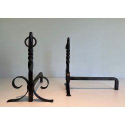 Pair of Neoclassical Wrought Iron Andirons with Twisted Column Uprights, Ring Finials and Scrolled Feet. France. Circa 1920.