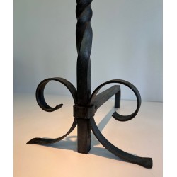 Pair of Neoclassical Wrought Iron Andirons with Twisted Column Uprights, Ring Finials and Scrolled Feet. France. Circa 1920.