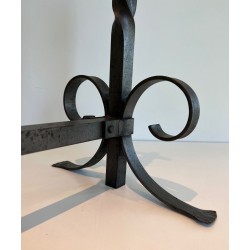 Pair of Neoclassical Wrought Iron Andirons with Twisted Column Uprights, Ring Finials and Scrolled Feet. France. Circa 1920.
