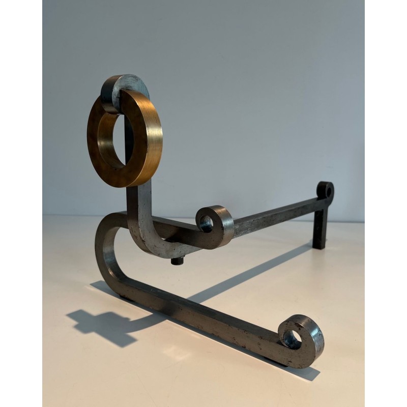 Pair of Modernist Andirons with Large Brass Ring Uprights and Chromed Steel Horseshoe Log Rests. France. Circa 1970.