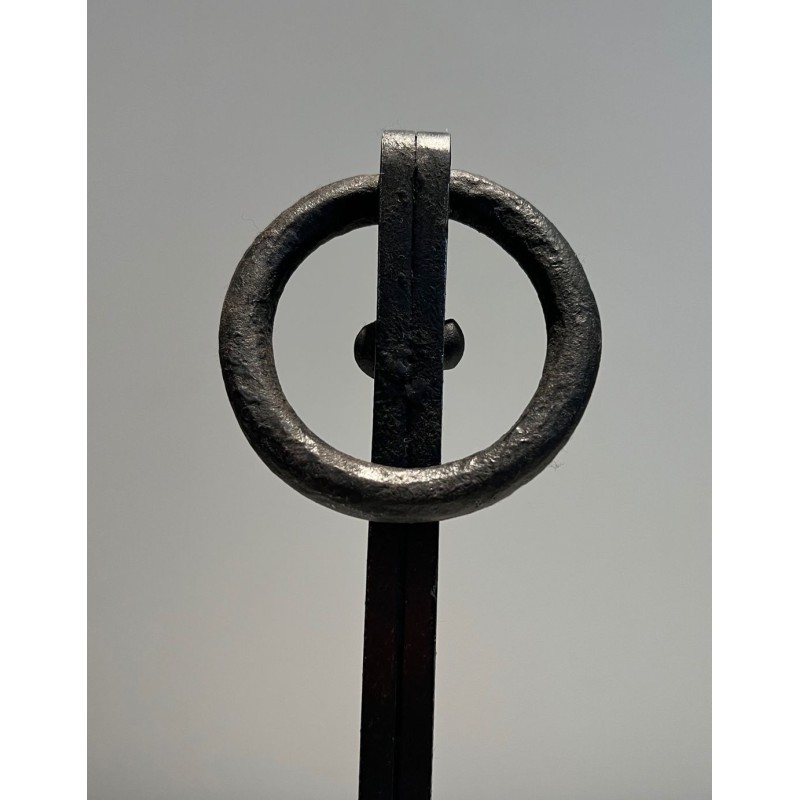 Pair of Modernist Wrought Iron Andirons with Ring Finials and Splayed Tripod Bases. France. Circa 1940.