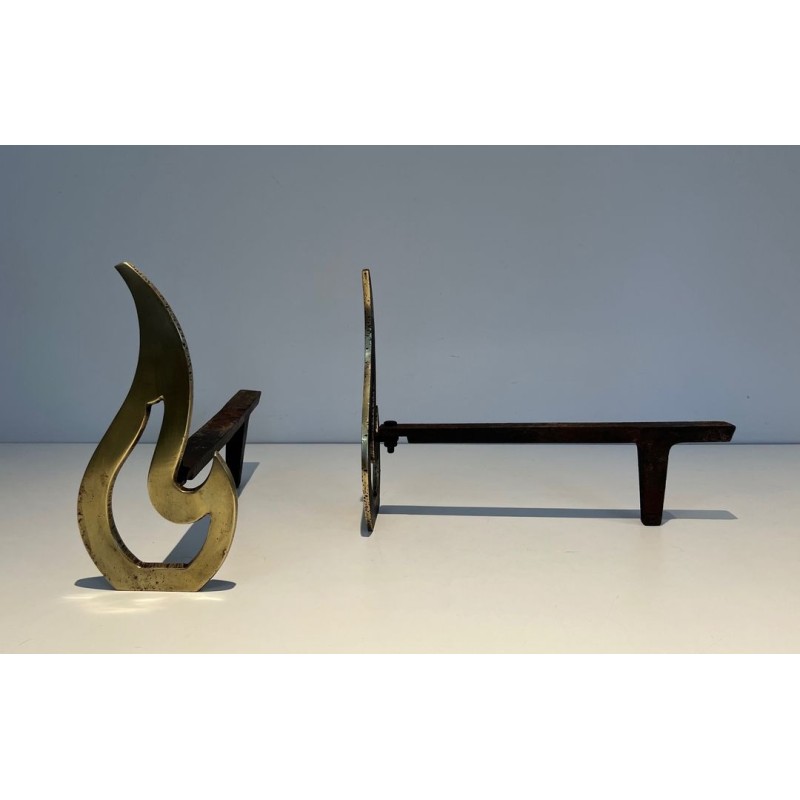 Pair of Brass Andirons with Sculptural Flame Uprights. France. Circa 1920.