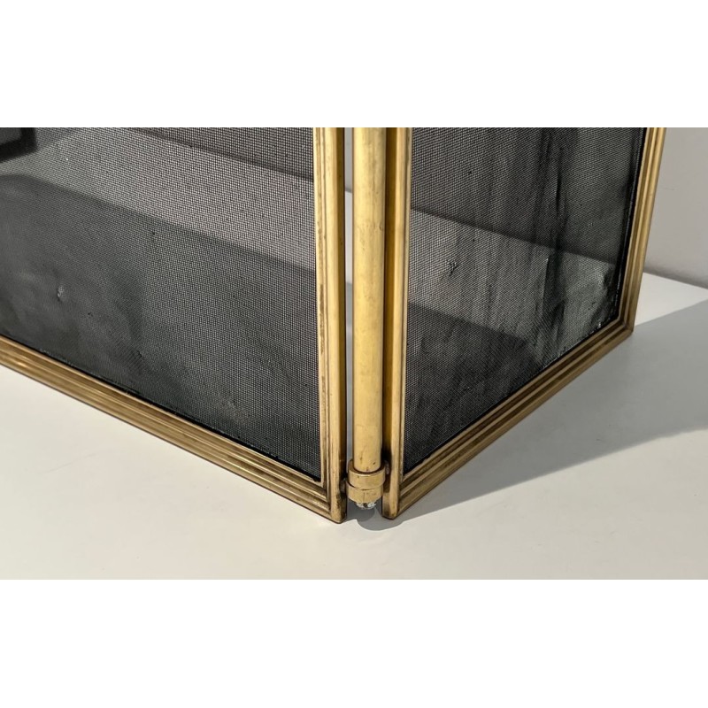 Three-Panel Neoclassical Brass and Wire Mesh Folding Fireplace Screen with Rope-Twist Frame. France. Circa 1970.