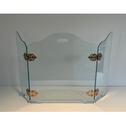Modernist Folding Glass Fireplace Screen with Ornate Bronze Hinge Medallions. France. Circa 1970.