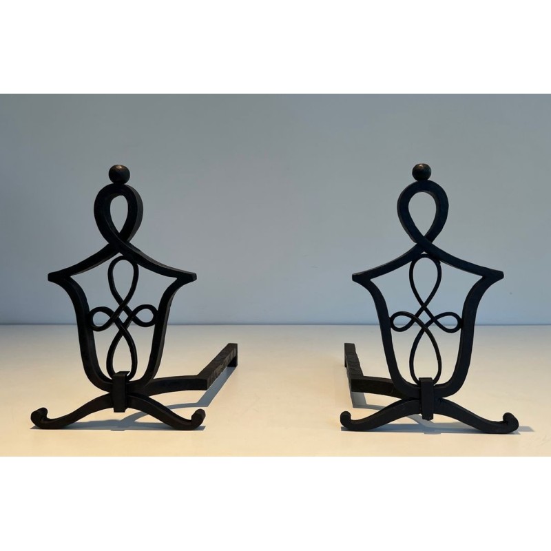 Pair of Wrought Iron Andirons with Interlaced Latticework Uprights in the Manner of Raymond Subes. France. Circa 1940.