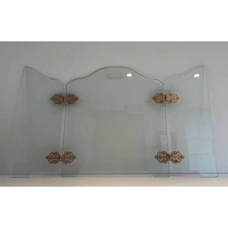 Modernist Folding Glass Fireplace Screen with Ornate Bronze Hinge Medallions. France. Circa 1970.