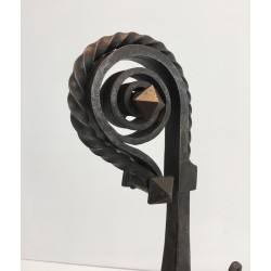 Monumental Pair of Wrought Iron Andirons with Snail-Shell Spiral Finials and Spit-Rest Arms. France. Circa 1900.
