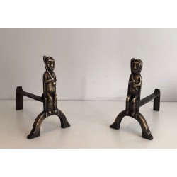 Pair of Bronze Andirons with Seated Shaman Figures, Monogrammed Anton Prinner. France. Circa 1930.