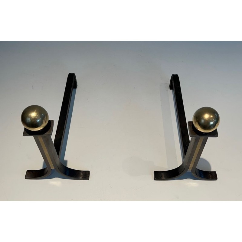 Pair of Modernist Steel and Brass Ball-Finial Andirons in the Manner of Jacques Adnet. France. Circa 1940.