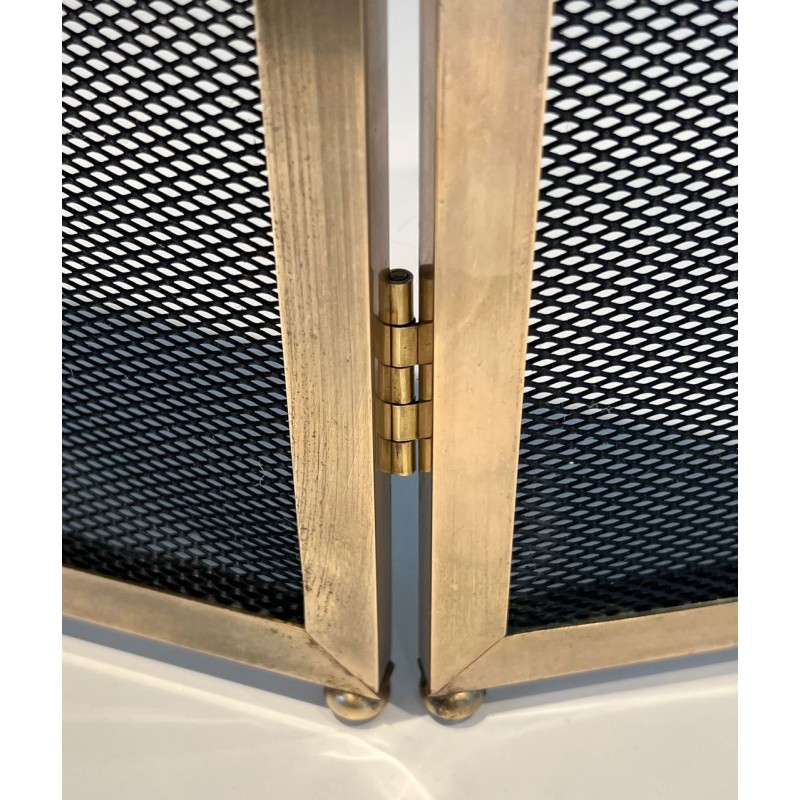 Three-Panel Modernist Brass and Wire Mesh Folding Fireplace Screen with Rounded Frame Profiles. France. Circa 1970.