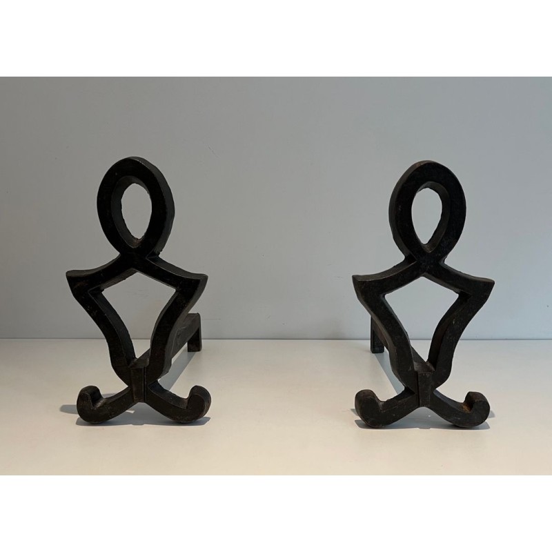 Pair of Wrought Iron Andirons with Oval Loop Finials and Hourglass Uprights by Raymond Subes. France. Circa 1940.