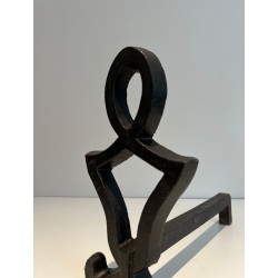 Pair of Wrought Iron Andirons with Oval Loop Finials and Hourglass Uprights by Raymond Subes. France. Circa 1940.