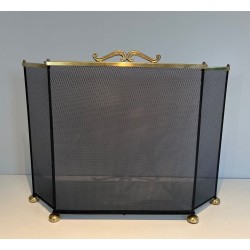 Three-Panel Gilt Brass and Wire Mesh Folding Fireplace Screen with Rococo Scroll Crest Rail and Ball Feet. France. Circa 1970.