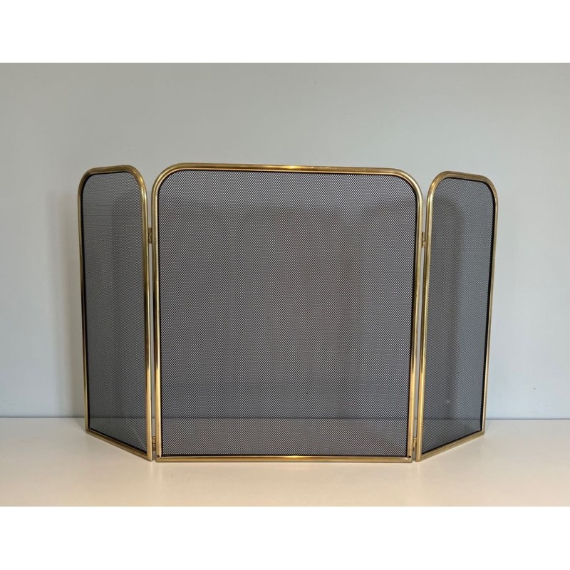 Three-Panel Modernist Brass and Wire Mesh Folding Fireplace Screen with Rounded Frame. France. Circa 1970.