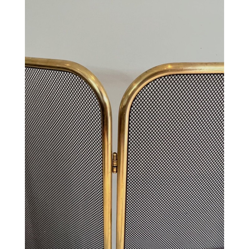 Three-Panel Modernist Brass and Wire Mesh Folding Fireplace Screen with Rounded Frame. France. Circa 1970.