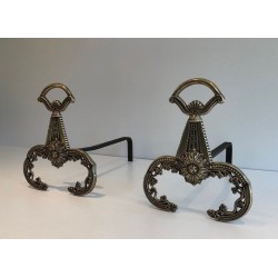 Pair of Neoclassical Bronze Andirons with Foliate Decoration and Scroll Feet. France. Circa 1900.