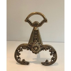 Pair of Neoclassical Bronze Andirons with Foliate Decoration and Scroll Feet. France. Circa 1900.