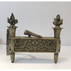 Pair of Empire-Style Bronze Chenets with Flambeau Finials and Chased Foliate Frieze, France, circa 1850