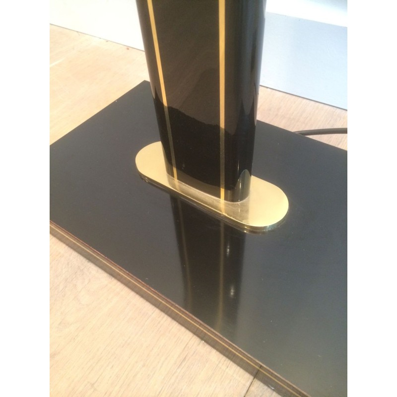 Black lacquered and brass floor lamp
