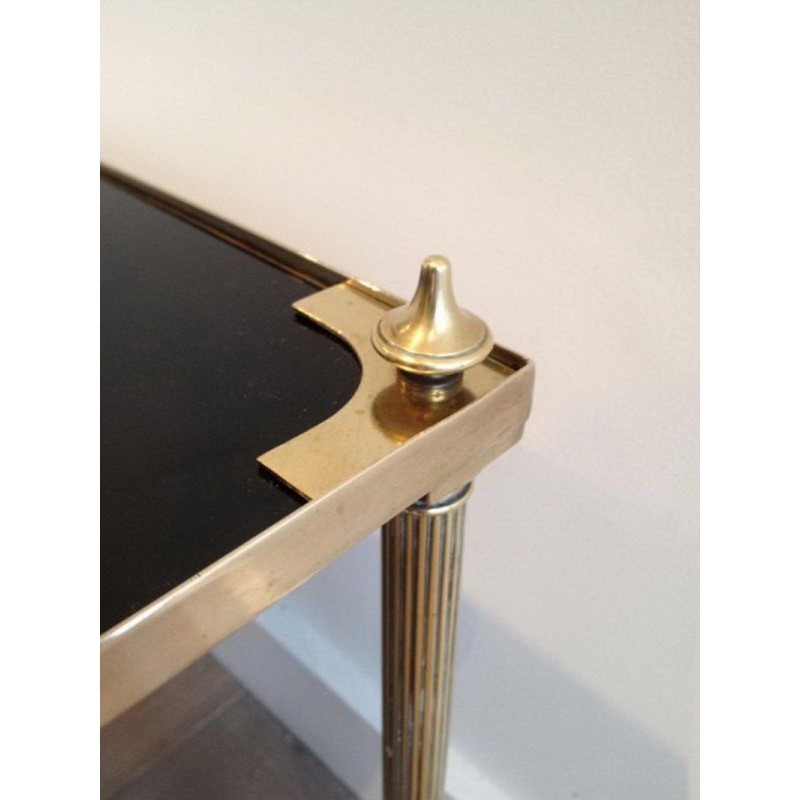 Coffee Table in Brass with Black Lacquered Glass Top by Maison Jansen. Circa 1940
