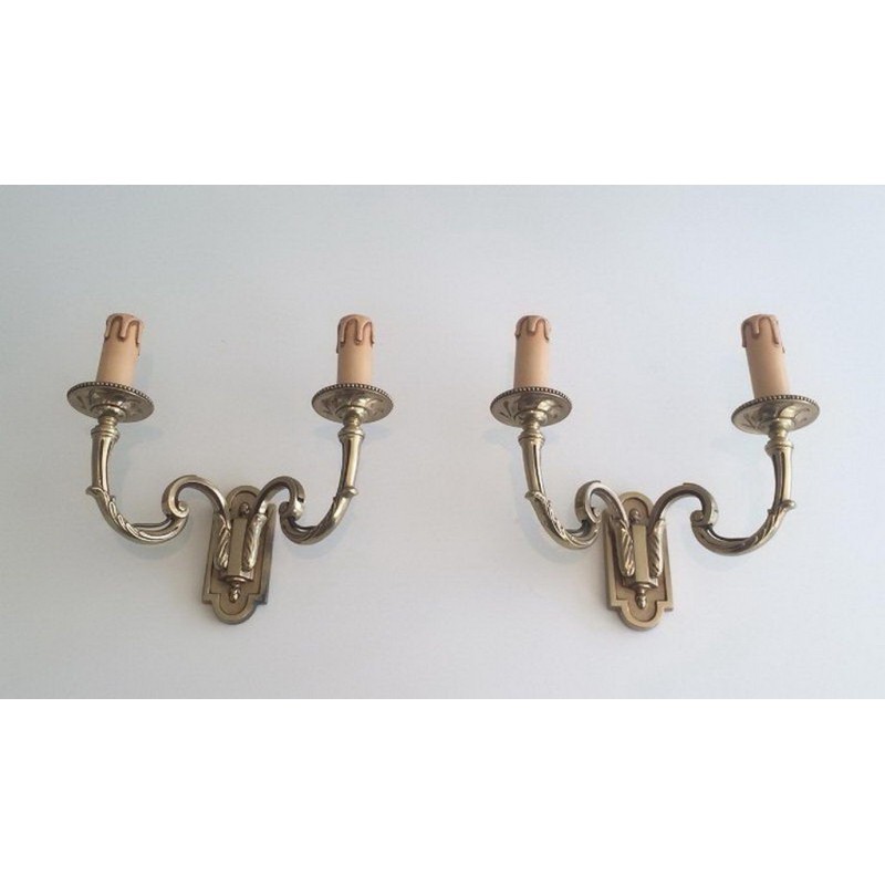 Pair of Neoclassical Bronze Wall Sconces. Circa 1970