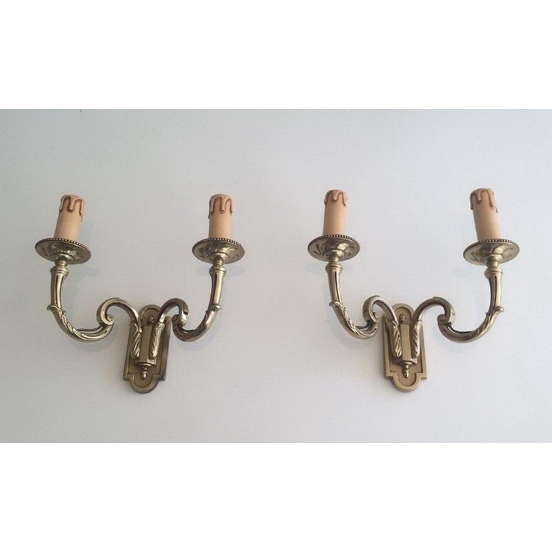 Pair of Neoclassical Bronze Wall Sconces. Circa 1970