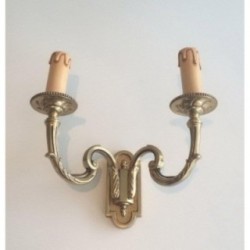 Pair of Neoclassical Bronze Wall Sconces. Circa 1970