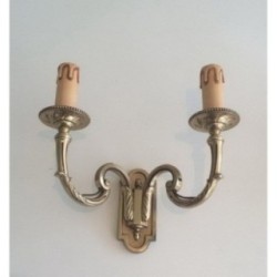 Pair of Neoclassical Bronze Wall Sconces. Circa 1970