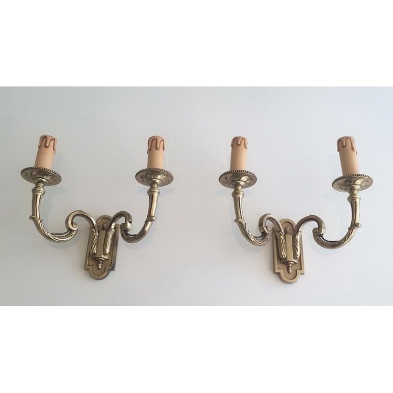 Pair of Neoclassical Bronze Wall Sconces. Circa 1970