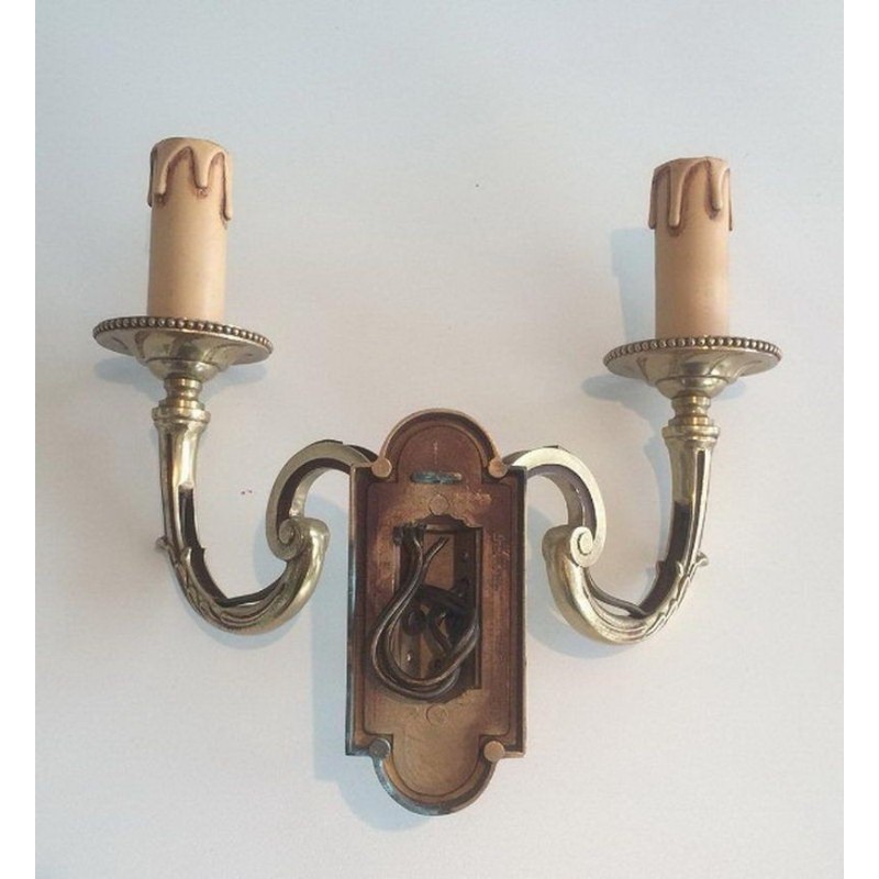 Pair of Neoclassical Bronze Wall Sconces. Circa 1970