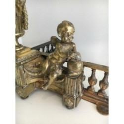 Paire de chenets en bronze ciselé figurant
