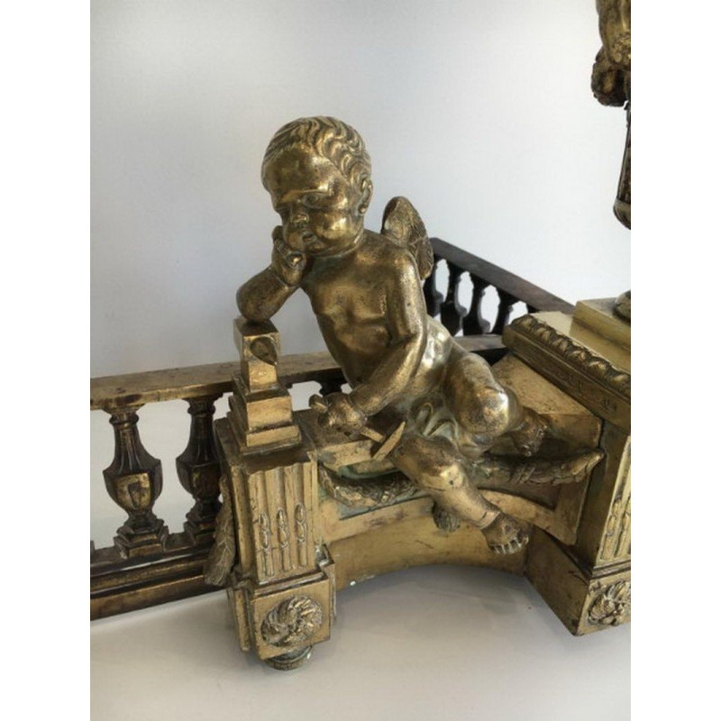 Paire de chenets en bronze ciselé figurant