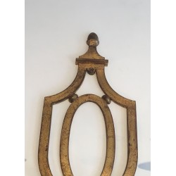 Wall Light in Gilt Wrought Iron with an Oval Escutcheon and Two Arms, in the Style of Gilbert Poillerat, Circa 1940